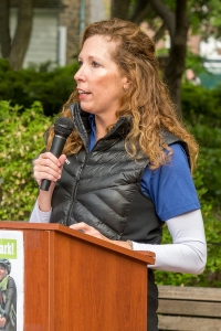 Pamela Steinebach speaking behind a podium